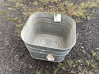 Square galvanized steel washtub, weathered but in good condition, shown from above