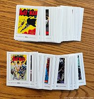 Stacked Batman Archives trading cards showing classic comic cover artwork, numbered 1-63.