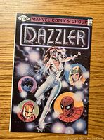 Front cover of the Dazzler #1 comic showing the character with other Marvel heroes.