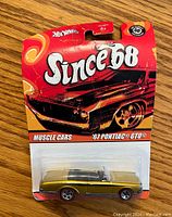 Front view of Hot Wheels Since 68 '67 Pontiac GTO sealed in product packaging.