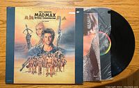 Front cover of Mad Max Beyond Thunderdome vinyl record showing Mel Gibson and other characters artwork.