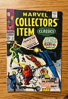 Front cover of Marvel Collectors' Item #14 comic showing Fantastic Four and Iron Man, Hulk references.