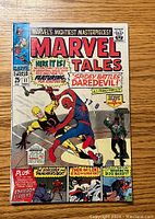 Front cover of Marvel Tales #11 comic showing Spider-Man battling Daredevil and additional story features.