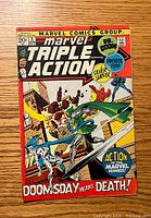 Front cover of Marvel Triple Action #3 comic showing characters and vibrant action scene with Dr. Doom, Silver Surfer, and Fantastic Four.