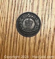 Reverse side showing crown surrounded by a floral wreath, denomination and year 1861.