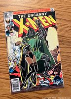 Front cover of The Uncanny X-Men #145 showing the comic title, Marvel Comics branding, price, and main cover art with Doctor Doom and Storm.