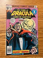 Front cover of Tomb of Dracula #55 comic book showing Dracula and large moon with comic title and issue details.