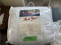 Queen duvet set in bag showing product label with details about duvet, cover, and pillow cases.