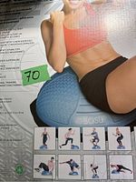 Front side of the box showing a person exercising on the blue BOSU Nexgen Balance Trainer half ball, including various exercise illustrations.