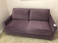 Full front view of purple two-seat sofa bed