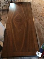 Top view of wood coffee table showing wood grain pattern on surface