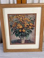 Full view of framed print showing oak wood frame, cream matting, and floral chrysanthemum print.