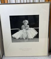Full view of the framed black and white Marilyn Monroe photograph print by Milton H Greene showing the entire image and frame.