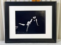 Framed Marilyn Monroe black and white print showing overall front view of the frame and artwork.