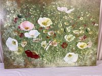 Full view of the flower print artwork showing colorful flowers and textured background.