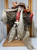Front view of the full vintage Japanese Kabuki doll showing full body and costume.