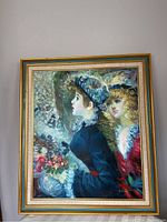 Front view of framed oil painting depicting two women, one with a blue hat and dark dress, the other with blonde hair and red dress, signed R. Pemeo.