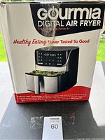 Front view of the Gourmia Digital Air Fryer box showing product image and branding.