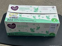 Photo of sealed box of Parent's Choice fragrance free baby wipes showing box details and count.
