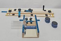 Overall view of tapering jig, small parts sled, and four bench cookies