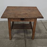 Front view of table showing overall structure and wear