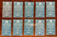10 pieces of 0.25 grain .999 fine platinum bullion sealed in tamper-evident packaging with blue Benchmark Strategic Metals certificates of authenticity