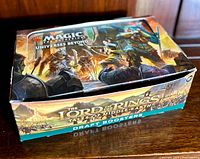 Closed Magic: The Gathering Universes Beyond booster display box showing exterior artwork