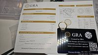 GRA grading report and presentation box background with ring