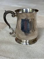 Front right view showing tapered body and handle