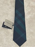 Front view of tie showing full length and attached Burberry London tag