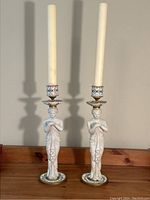 Front view of both candlesticks with candles installed