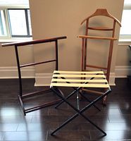 Overall view of the wood valet rack, blanket rack, and foldable luggage stand placed on a hardwood floor.