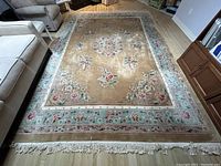 Full overhead view of rug showing field and border