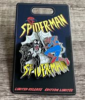 Pin showing Venom and Spider-Man in battle pose with Spider-Man logos and limited release text on backing card.