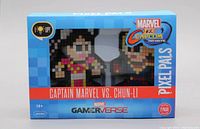 Front view of the sealed Gameverse Marvel vs. Capcom Infinite Captain Marvel vs. Chun-Li Pixel Pals 2-pack box showing pixel art figures and branding