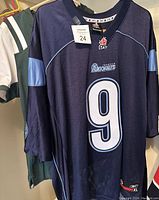 Front view of the Reebok CFL Argonauts jersey number 9 with CFL logo and Argonauts team name, men's XL.