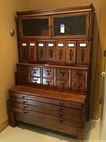 Full front view showing entire three-tier structure