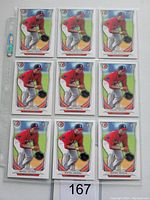 Front view of nine Rafael Devers baseball cards from 2014 Bowman Top Prospect series in red uniform, arranged in a 3x3 grid.