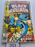 Front cover of Black Goliath #4 showing superhero fight scene and title with price in top left corner.