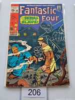Front cover shows Fantastic Four #90 priced at 15 cents, featuring The Skrull with the text 'The Skrull takes a Slave!'. The cover art shows some aging and wear around edges.