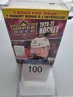 Front view of sealed 2020-21 Upper Deck Hockey Extended Series blaster box showing player image, brand, and bonus pack banner.