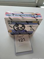 Front view of the sealed unopened mini box showing 15 cards per pack and Chronicles LaLiga Soccer branding.