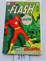 Front cover of The Flash #188 comic book showing the Flash facing a green villain in a city backdrop.