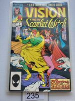 Front cover of Vision and the Scarlet Witch #1 comic book showing title, characters, price, issue number, and series information.