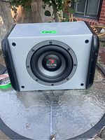 Front view of the Focal speaker showing the single circular driver and Focal logo.