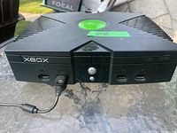 Front view of Xbox console showing controller ports and power button