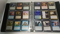 First image shows a black 3-ring binder open, revealing 18 Magic The Gathering cards in three rows of 3 per page (two pages shown). Cards display various colored borders and fantasy artwork.