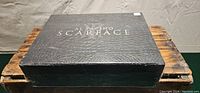 Black faux-leather box with crocodile texture labeled Scarface featuring Al Pacino.