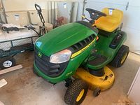 Front perspective of John Deere D110 ride-on mower