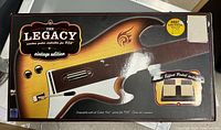 Box of The Legacy Vintage Edition guitar controller showing sunburst finish and logo